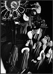 Washington, D.C. Field trips for the "flying nun" pre-flight class, including inspection tours of hangars at the Washington National Airport. Here, Sister Aquinas is explaining engine structure to her students (LOC)