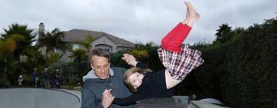 Photo: Tony Hawk photo stirs controversy

The legendary skateboarder posts a photo of him performing a 'frontside fling' with his daughter – but critics call him out because neither are wearing protective gear: http://bit.ly/TCeyBX

He responded to the critics with a bit of sarcasm: "It's more likely that you will fall while walking on the sidewalk than I will while skating with my daughter."