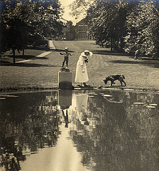 Elisabeth Severance Allen Prentiss with dog behind lily pond at Glenallen (1915-1945)