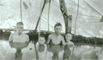 "Coyote" John Schneider with Ramasco children, group portrait at Hot Springs in Paradise Valley, ca. 1918