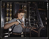 Operating a hand drill at the North American Aviation, Inc., [a] woman is in the control surface department assembling a section of the leading edge for the horizontal stabilizer of a plane (LOC) by The Library of Congress