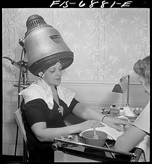 New York, New York. Getting a manicure while drying hair at Francois de Paris, a hairdresser on Eighth Street (LOC)