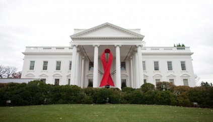 A red ribbon is displayed on the North Portico of the White House / White House Image