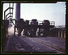 Coal feeders on tip of coke ovens, Hanna furnaces of the Great Lakes Steel Corporation, Detroit, Mich. (LOC) by The Library of Congress