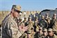 U.S. Marine Corps Gen. John R. Allen, commander of U.S. and international forces in Afghanistan, speaks with troops on Christmas on Combat Outpost Jannat in southern Afghanistan, Dec. 25, 2012.  U.S. Army photo by Sgt. Ashley Curtis