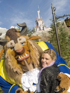 Julie Bowen, star of ABC’s comedy series ‘Modern Family,’ takes a waltz with The Beast from Disney’s ‘Beauty and the Beast’ in New Fantasyland at the Magic Kingdom theme park December 28, 2012 in Lake Buena Vista, Florida
