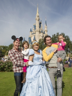 Rebecca Romijn and Jerry O’Connell marked their twin daughters’ birthdays at the Magic Kingdom with a visit from Cinderella in front of Cinderella Castle at the Walt Disney World theme park December 28, 2012 in Lake Buena Vista, Florida