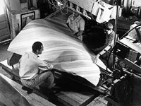 Griswald Raetze and Office Staff Working on a Molded- Plywood Airplane Part