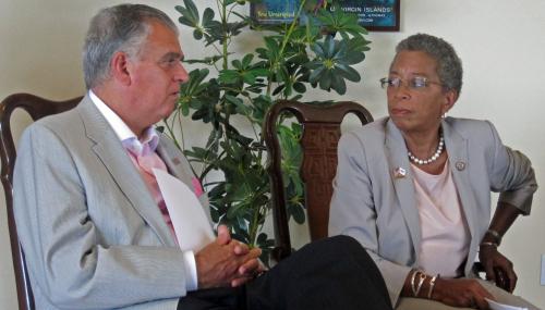 Transportation Secretary Ray LaHood converses with V.I. Delegate to Congress Donna M. Christensen before a press conference in the Virgin Islands feature image