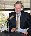 Senator Crapo in radio studio during news conference
