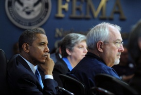 President Barack Obama, left, listens to members of his cabinet discuss updates on responses to Hurricane Sandy during a cabinet meeting that President Barack Obama held at FEMA headquarters