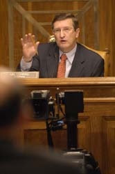 Senator Conrad at a press conference regarding the national debt