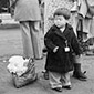 Japanese-American child who will go with his parents to Owens Valley.
