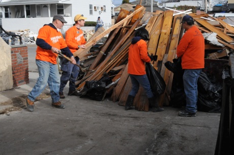 Volunteers Clear Home of Storm Debris