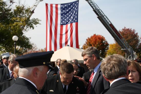 Speaking with local firefighters at the dedication of the new Minnesota Firefighters Memorial