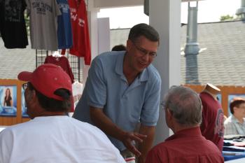 Erik Paulsen speaks with fairgoers after appearing on WCCO Radio's 