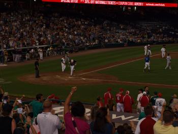 Rep. Paulsen crosses home plate during the 50th annual Congressional Baseball Game