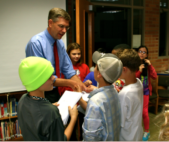 Paulsen visits with students at Highlands Elementary School in Edina