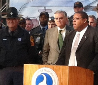 Photo of NHTSA Administrator David Strickland speaking at the kickoff event, with Transportation Secretary Ray LaHood at his side.