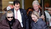 Secretary of State Hillary Clinton leaves New York Presbyterian Hospital with husband, Bill, and daughter, Chelsea, in New York