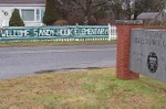 This December 2012 photo provided by The Newtown Bee shows a sign welcoming Sandy Hook Elementary School students, of Newtown, Conn., to the Chalk Hill School campus in neighboring Monroe, Conn.