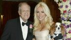 Hugh Hefner with his new wife Crystal Harris and her dog Charlie