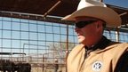 A Texas ranger checking cattle