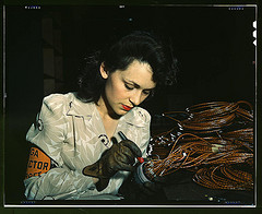 Woman aircraft worker, Vega Aircraft Corporation, Burbank, Calif. Shown checking electrical assemblies (LOC)