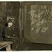 Vance, a Trapper Boy, 15 years old. Has trapped for several years in a West Va. Coal mine. $.75 a day for 10 hours work. All he does is to open and shut this door: most of the time he sits here idle, waiting for the cars to come ... (LOC)