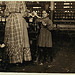 Little Fannie, 7 years old, 48 inches high, helps sister in Elk Mills. Her sister (in photo) said, "Yes, she he'ps me right smart. Not all day but all she can. Yes, she started with me at six this mornin'."  ... Location: Fayetteville, Tennessee (LOC)