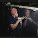 Operating a hand drill at Vultee-Nashville, woman is working on a "Vengeance" dive bomber, Tennessee (LOC)