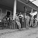 Fourth of July, near Chapel Hill, North Carolina. Rural filling stations become community centers and general loafing grounds. The men in the baseball suits are on a local team which will play a game nearby. They are called the Cedargrove Team (LOC)