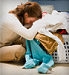 woman collapsed over laundry