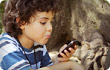 little boy with cell phone