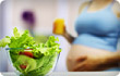 pregnant woman with salad