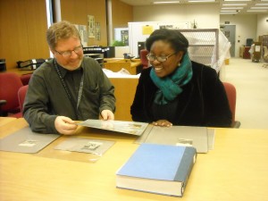 Jeff Bridgers and Kya Mangrum look at research materials