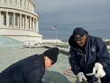 AOC staff from the Capitol Sheet Metal Shop make repairs on the roof of the Capitol.