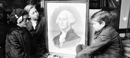 Image of school children looking at a painting of George Washington
