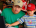 Family at a lap top at The National Book Festival