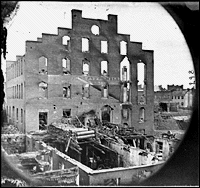 Richmond, Va. Ruins of paper mill; wrecked paper-making machinery in
foreground