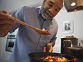 Many minorities rely on social security during retirement- a senior man cooking dinner at home