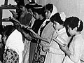 Colville girls singing in choir, St. Mary's Mission School, Omak, Washington, 1959