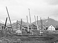 Gitksan totem poles, grave houses and dwellings, Kitwancool, British Columbia, 1910