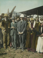 Group of men near an airplane