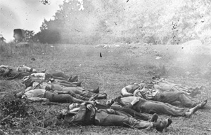 Photograph of dead soldiers in a field