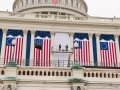 AOC employees hang flags and bunting in preparation for the 2009 Inaugural
