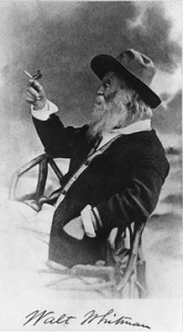 Walt Whitman, half-length portrait, seated, facing left, wearing hat and sweater, holding butterfly. Prints and Photographs Collection, Library of Congress.