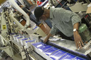 GPO bindery employee working on 2013 budget