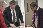Steve LeBlanc, managing director of GPO's Security and Intelligent Documents business unit, shows products to Acting Public Printer Davita Vance-Cooks.