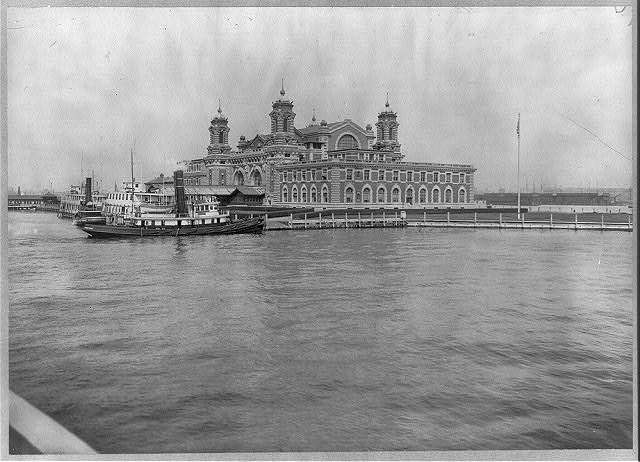 [View of Ellis Island, N.Y., looking across water toward immigration station]